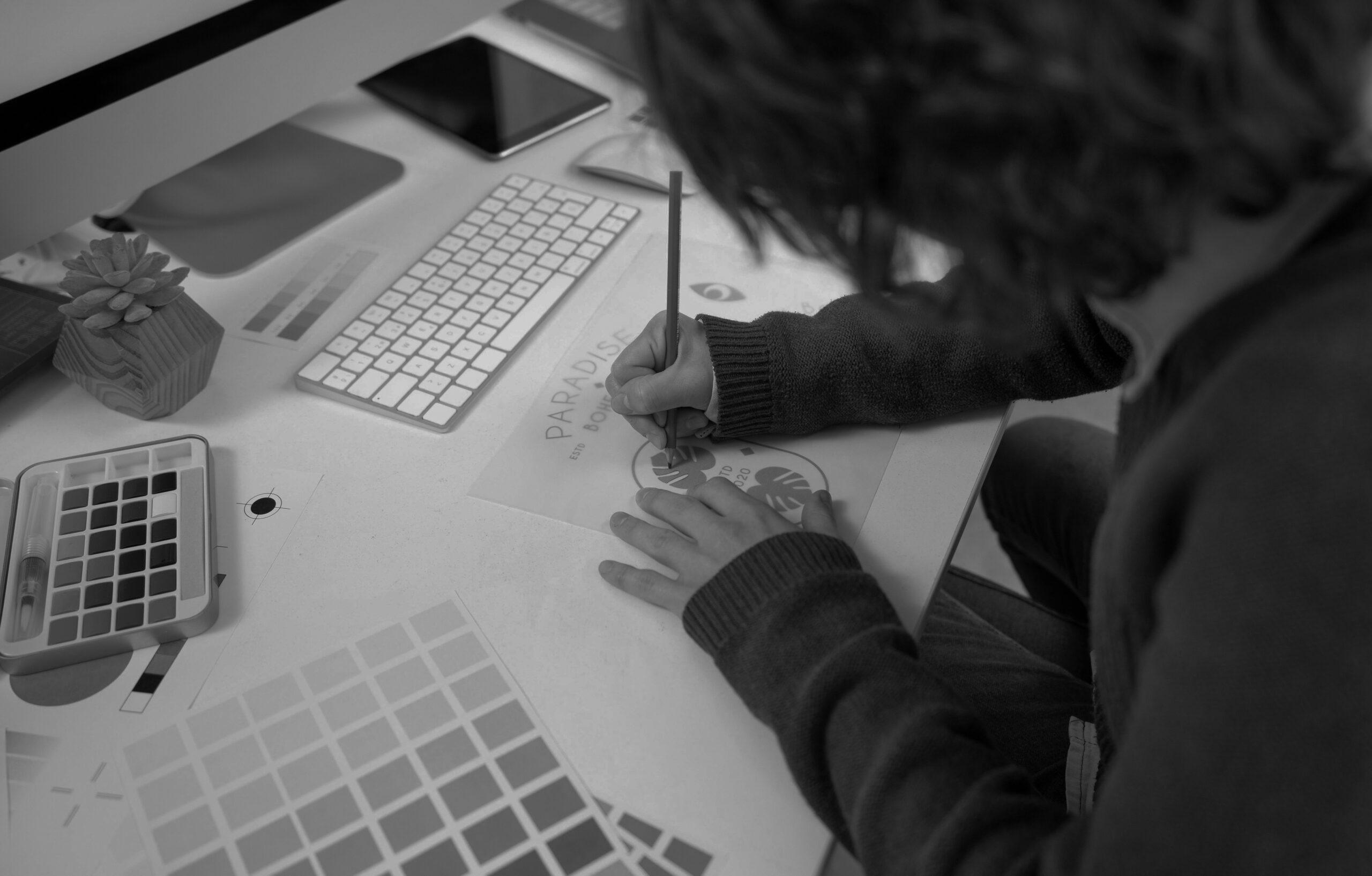 graphic-designer-making-logo-notebook